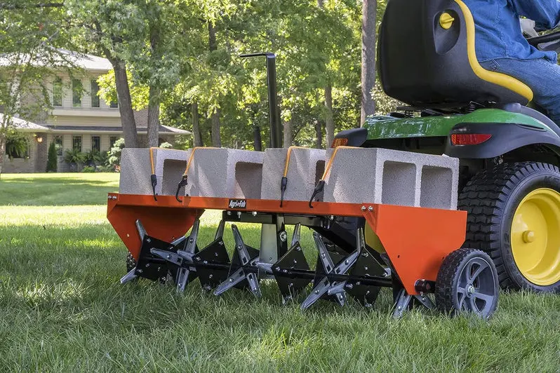 48-Inch Tow-Behind Plug Aerator – Heavy-Duty Lawn Aeration Tool in Orange/Black for Turf Health