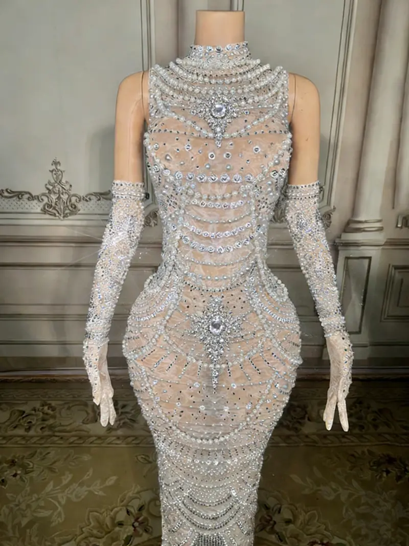 Beaded White Mermaid Gown – High-Neck Sleeveless Style Featuring Open Back Detail and Floor-Sweeping Hemline 2