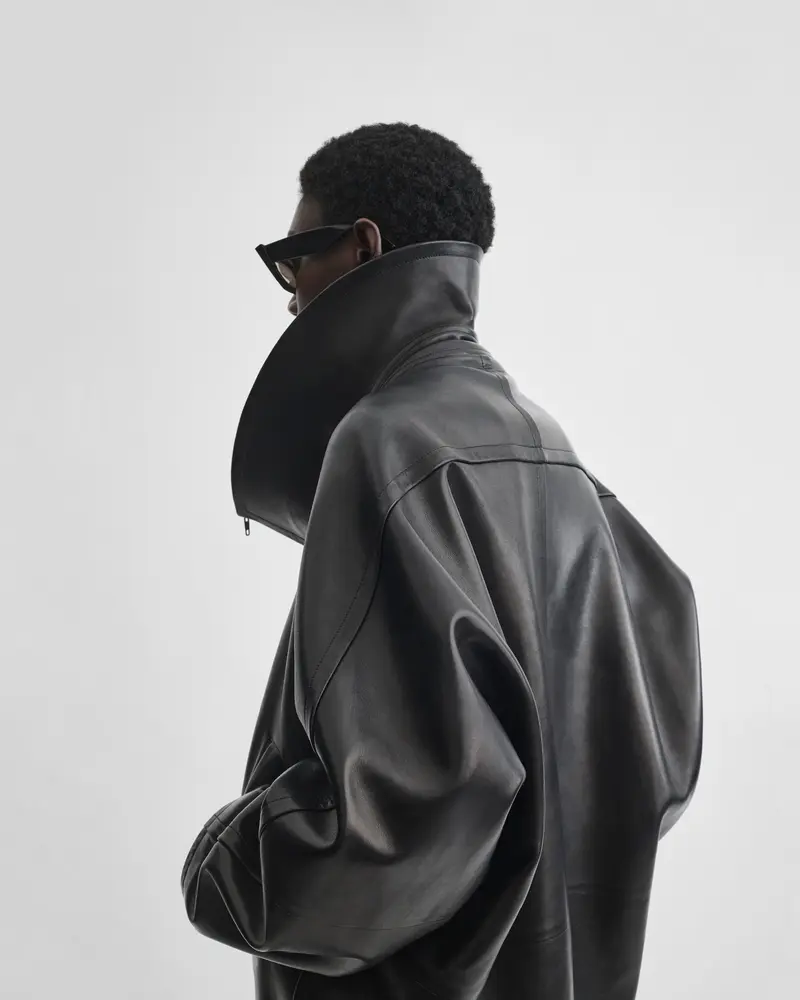 Black Leather Swathe Jacket | Exaggerated Funnel Neck Design