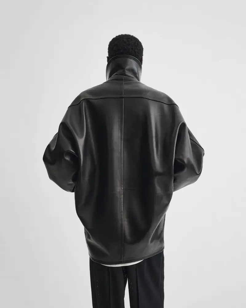 Black Leather Swathe Jacket | Exaggerated Funnel Neck Design