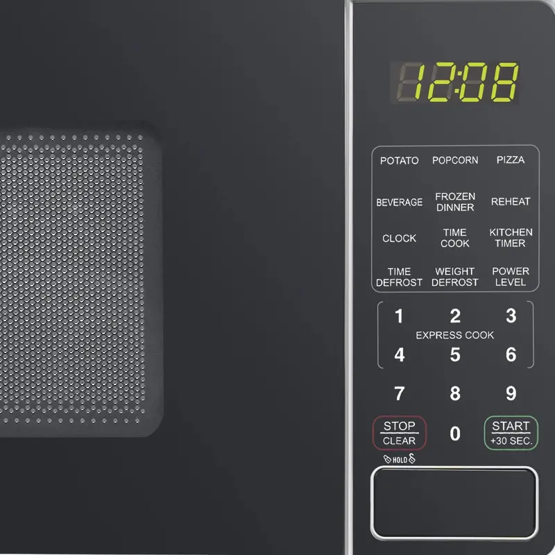 Mainstays 0.7 Cu. Ft. Compact Microwave Oven – 700W Countertop Appliance in Sleek White