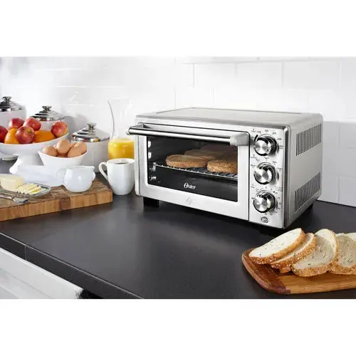Oster Convection Toaster Oven – Stainless Steel Family-Sized Appliance with Adjustable Racks and Rapid Heat Technology