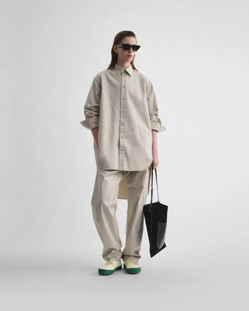 Stone Cotton Arch-Trouser With Curved Leg Design